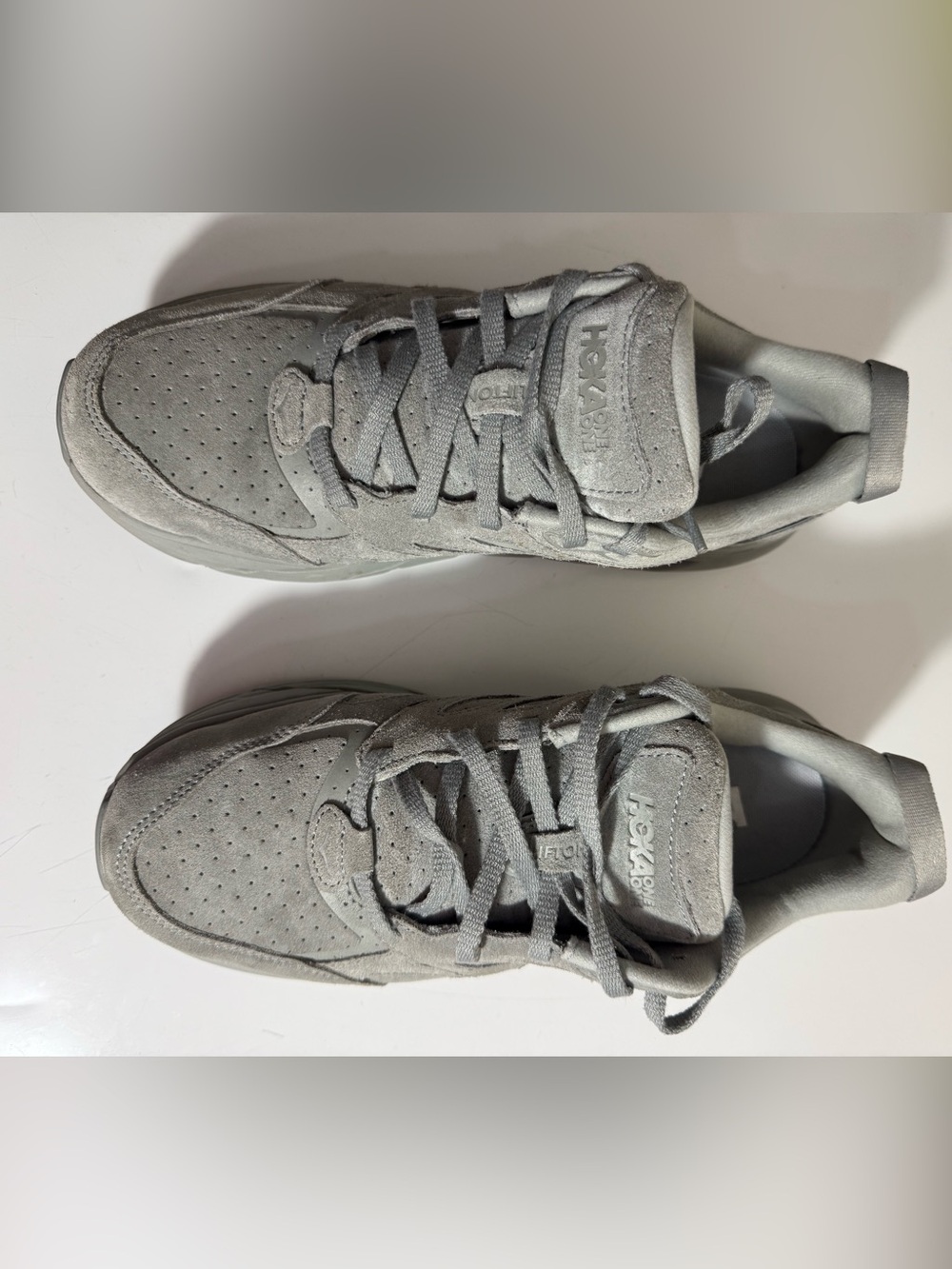 Hoka One One Light Grey Suede Slip-In Sneaker